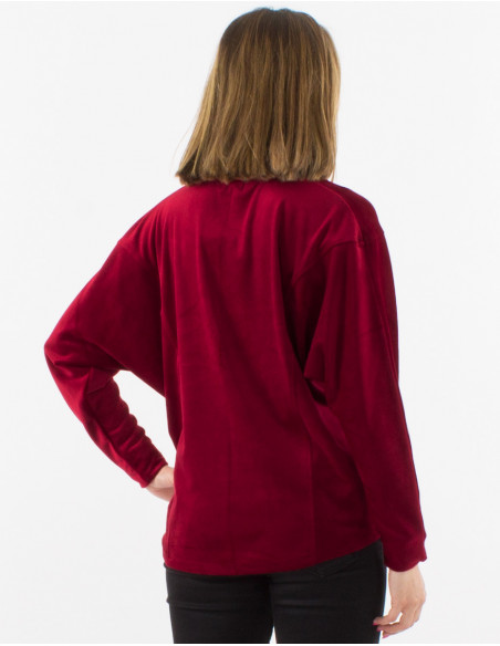 Blusa malla 95% poliester 5% elastano con botones terciopelo ras