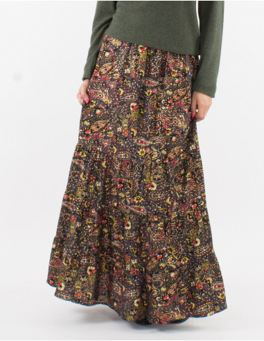 Falda poliester doblada con volantes estampado...