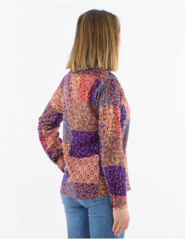 Blusa poliester con botones mangas largas...