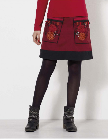 Falda algodón con bordados y pompones