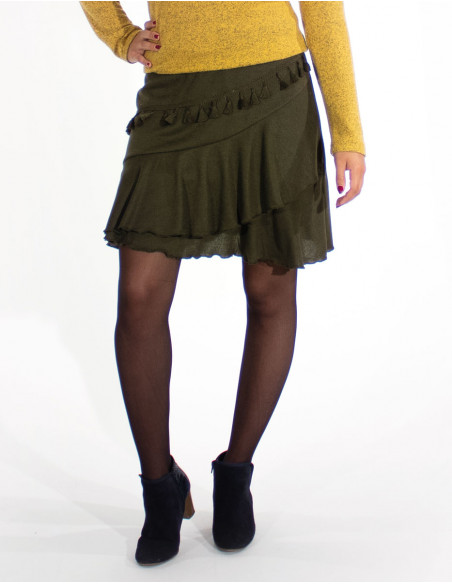 Falda malla 95% poliéster 5% elastano con pompones