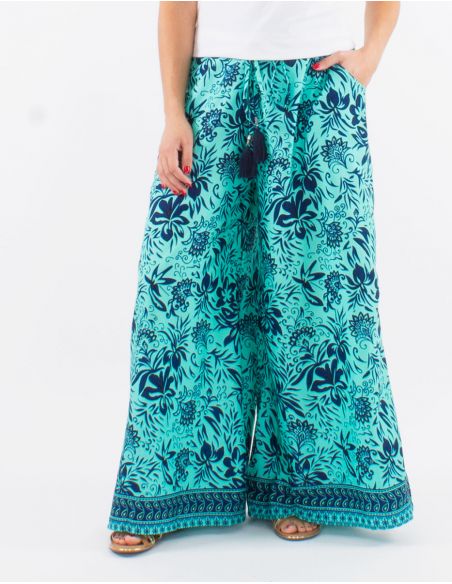 Pantalon poliester cintura espalda elastica estampado palma