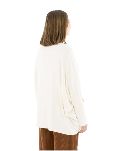 Jersey poncho 65% viscosa 30 % poliester 5% elastano bordado